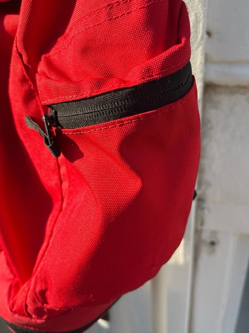 Nike Red Backpack with White Swoosh and Accents